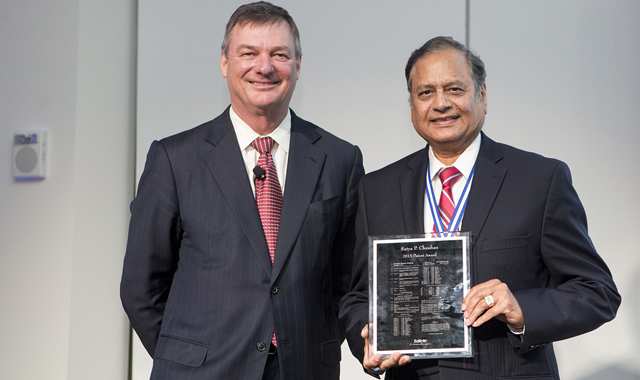 Jeff Wadsworth posing with Satya Chauhan and his award