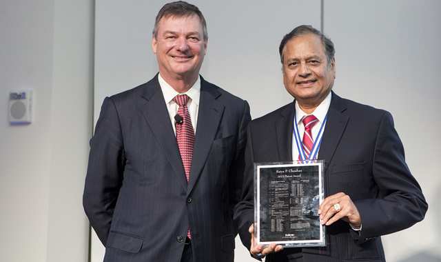 CoS092 Jeff Wadsworth posing with Satya Chauhan and his award