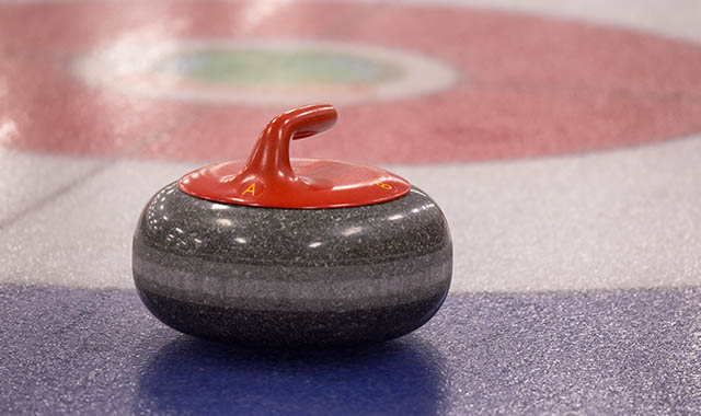 curling stone on ice