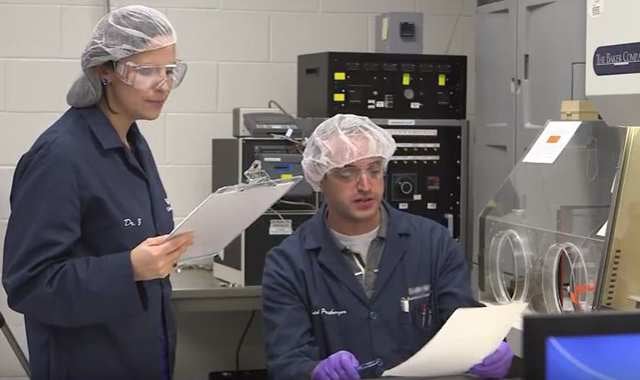 David Pressburger and Amy Zmarowski working in the lab