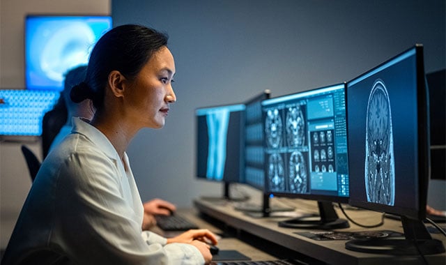 Image: Clinician using AI-assisted technology