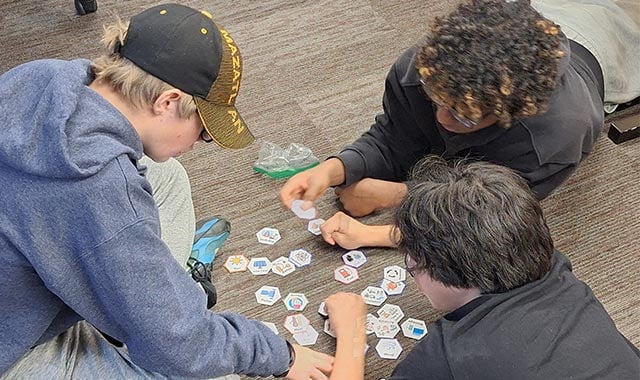 alt=stem students from the Kenai Peninsula Borough School District participating at the amped on energy camp