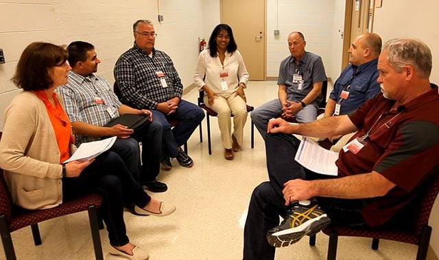 alt= the losa team meeting to discuss new lab safety protocols