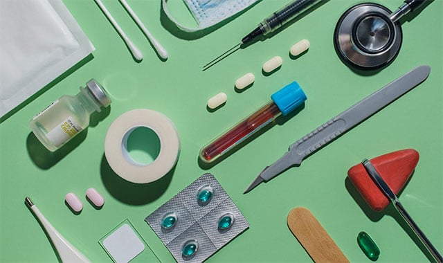 Image: Various medical devices laid on a flat surface