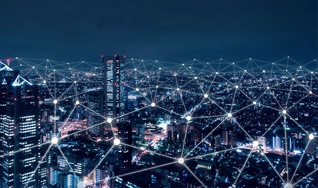 Image: Mobile network across a night cityscape