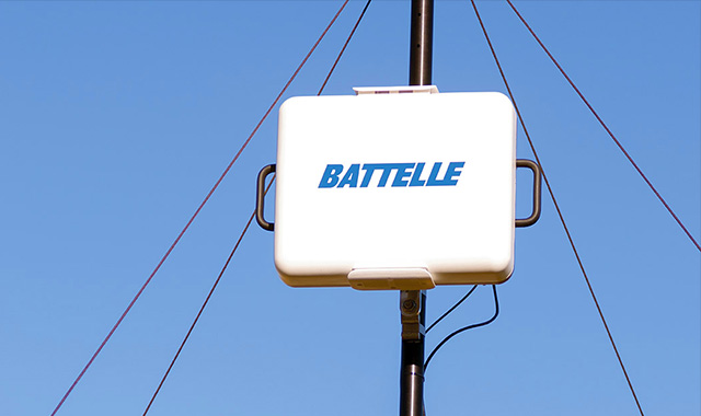 alt= The Battelle’s RavenStar™ Antenna System posted on a telephone wire