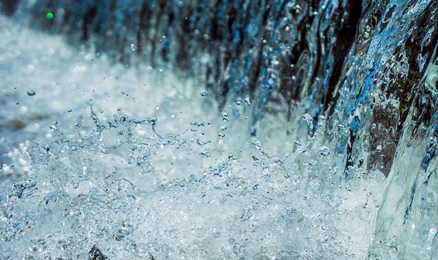 water splashing from a waterfall